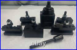 USED - AXA Wedge & Piston Quick Change Tool Set, for Lathe Swing 9-12 USED - AXA Wedge & Piston Quick Change Tool Set, for Lathe Swing 9-12