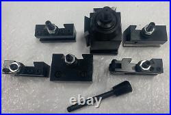 USED - AXA Wedge & Piston Quick Change Tool Set, for Lathe Swing 9-12 USED - AXA Wedge & Piston Quick Change Tool Set, for Lathe Swing 9-12
